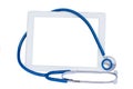 Medical tablet with blue stethoscope Royalty Free Stock Photo