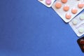 Medical tablets, capsules and pills in blister pack frame as background with space for text or image. Royalty Free Stock Photo