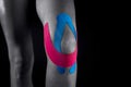 Medical taping for knee stabilization. Royalty Free Stock Photo
