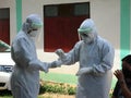 Medical team conduct COVID-19 coronavirus Rapid test PCR test ,cover in PPE suit, CDCU team Buriram province, Thailand