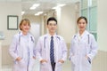 Medical team discussing in the corridor at hospital, team of mixed-races doctors, Group of multi ethnic medics Royalty Free Stock Photo