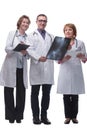 Medical team discussing diagnosis of x-ray image Royalty Free Stock Photo