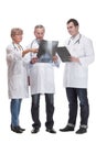 Medical team discussing diagnosis of x-ray image Royalty Free Stock Photo
