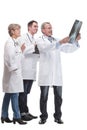 Medical team discussing diagnosis of x-ray image Royalty Free Stock Photo