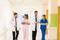 Medical Team Discussing Together In Hospital Corridor Royalty Free Stock Photo