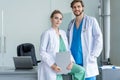 Medical Team Discussing Treatment Options With Patients. Team of doctors having a meeting in the meeting room Royalty Free Stock Photo