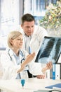 Medical team discussing x-ray image Royalty Free Stock Photo