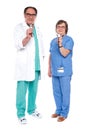 Medical team of doctors holding stethoscope Royalty Free Stock Photo