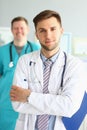 Medical team of doctors men looking at camera and smiling Royalty Free Stock Photo