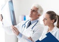 Medical team examining a patient's x-ray Royalty Free Stock Photo