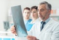 Medical team examining an x-ray Royalty Free Stock Photo