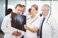 Medical team examining a x report Royalty Free Stock Photo