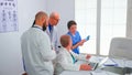 Medical team having a discussion about patient diagnosis Royalty Free Stock Photo