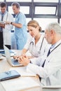 Medical team interacting in conference room Royalty Free Stock Photo