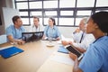 Medical team interacting in conference room Royalty Free Stock Photo