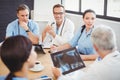 Medical team interacting in conference room Royalty Free Stock Photo