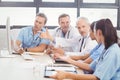 Medical team interacting in conference room Royalty Free Stock Photo