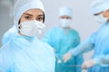 Medical team performing operation. Focus at female doctor Royalty Free Stock Photo