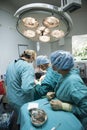 Medical Team Performing Surgical Operation i