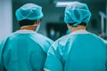 Medical Team Performing Surgical Operation in Modern Operating Room. Neural network AI generated Royalty Free Stock Photo