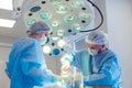 Medical Team Performing Surgical Operation in Modern Operating Room. Rhinoplasty Royalty Free Stock Photo