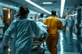 Medical Team Rushing Patient Through Hospital Corridor. Royalty Free Stock Photo