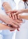 Medical team stacking hands