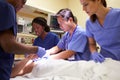 Medical Team Working On Patient In Emergency Room Royalty Free Stock Photo