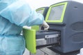 A Medical technician places Covid-19 test samples into a PCR Machine, also known a Thermal Cycler, in a cleanroom at a testing Royalty Free Stock Photo