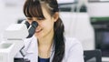 Medical technologist is working in the laboratory. Using a microscope for detect the objects that are too small for the naked eye. Royalty Free Stock Photo