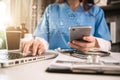 Medical technology concept. Doctor working with mobile phone and stethoscope. Royalty Free Stock Photo