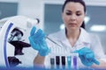 Serious attractive woman working in the test lab Royalty Free Stock Photo