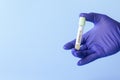 Coronavirus lab testing concept test tube in hand