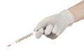 Medical theme: doctor's hand in white gloves holding a thermometer to measure the temperature of the patient on a white background Royalty Free Stock Photo