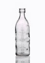 Medical transparent glass bottle with with measuring scale 200 milliliters isolated on a white background Royalty Free Stock Photo