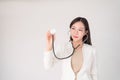 Medical, treatment, doctor, clinical, hospital, diagnosis, health checkup concept. Beautiful asian woman female doctor holding st