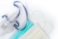 Medical ultrasonic inhaler or nebulizer oxygen mask and hygienic face masks on white background