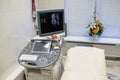 Medical ultrasonography machine is in hospital room, fetus imaging on screen