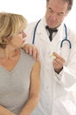 Medical visit - injection vaccination Royalty Free Stock Photo