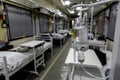 Medical wagon insode a special evacuation train with equipment, allowing to transport seriously injured servicemen and