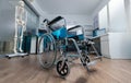 Medical wheelchair standing in empty doctor office used for invalid patient