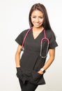 Medical woman wearing scrubs with stethoscope Royalty Free Stock Photo