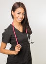 Medical woman wearing scrubs with stethoscope Royalty Free Stock Photo