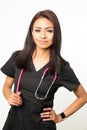 Medical woman wearing scrubs with stethoscope Royalty Free Stock Photo