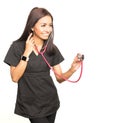 Medical woman wearing scrubs with stethoscope Royalty Free Stock Photo