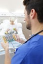 Medical worker configures equipment in icu Royalty Free Stock Photo