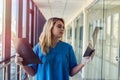 Medical worker looks at xray film of the skull to detect signs of the disease