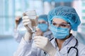 Medical worker prepares a drip of medicen into for installation