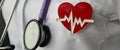 Medical worker stethoscope heart icon. Cardiologist therapist saves life through donation or charity Royalty Free Stock Photo