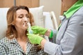 Medical worker treat lady, maintains oxygen balance Royalty Free Stock Photo
